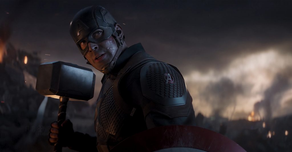 Captain America aka Steve Rogers played by Chris Evans wielding Thor's Hammer aka Mjolnir in Avengers: Endgame