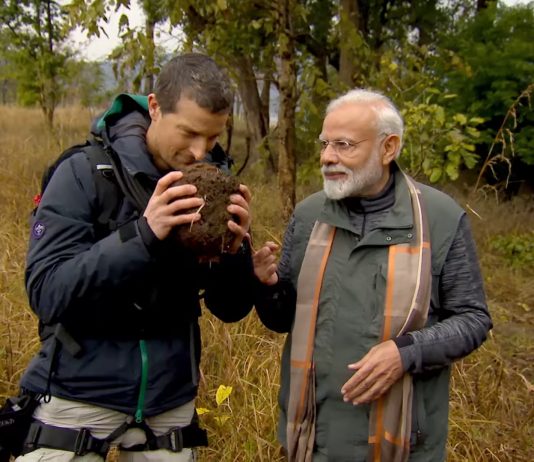 Bear Grylls with Prime Minister of India, Narendra Modi sniffing animal dung in the wild on Man vs. Wild show